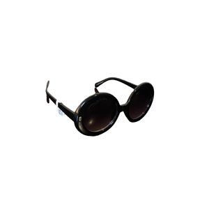 New woman’s round black sunglasses